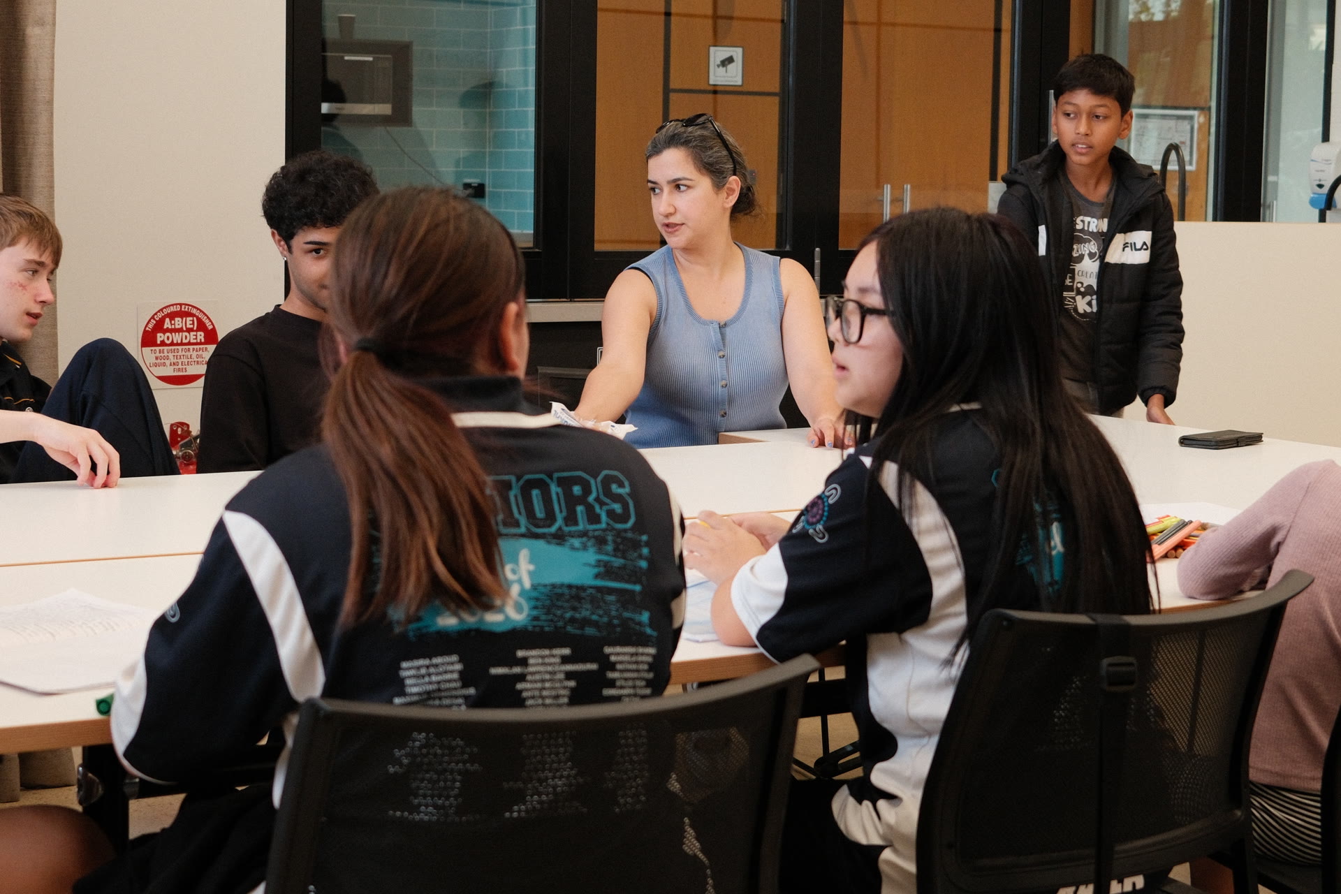 Youth and their animator in conversation at the Parks Library