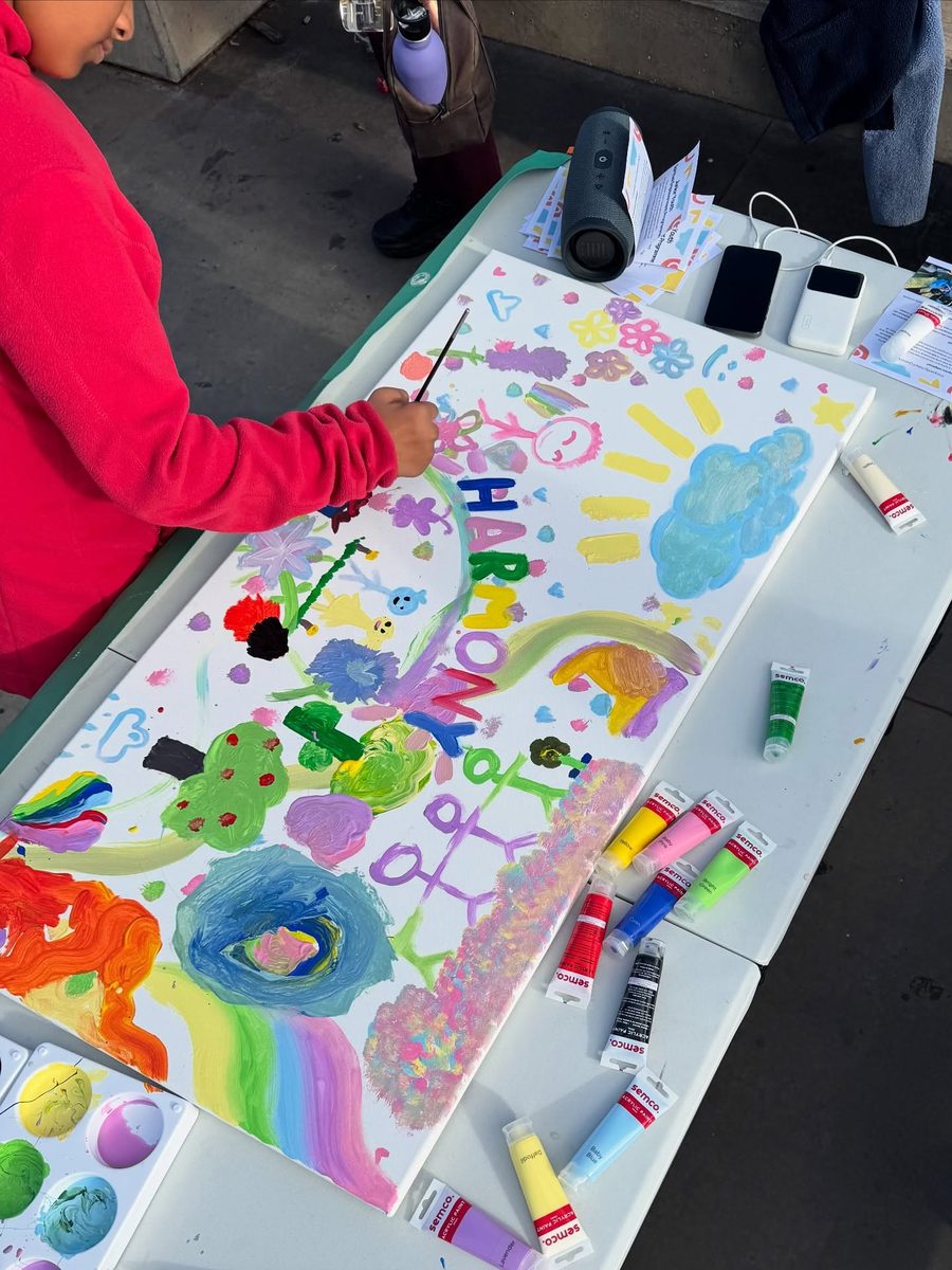 Painting a Harmony Day banner together